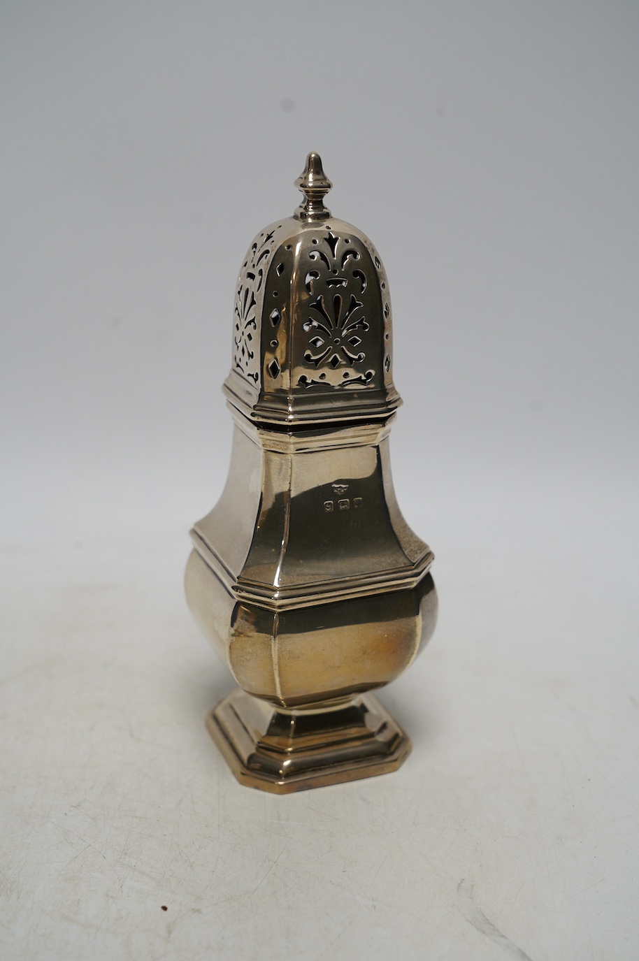 A George V silver octagonal sugar caster, by Mappin & Webb, Birmingham, 1923, 18.5cm, 7.2oz. Condition - fair to good